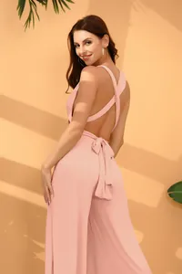 Sexy backless multi-way jumpsuit in pink with cross straps and wide leg design details