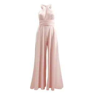 Detailed look at the multi-way halter neckline and pleated wide leg design of the jumpsuit