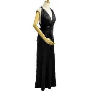 Side view detail of a black solid color multi-way wide-leg jumpsuit on mannequin