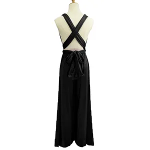 Detailed back view of a sexy black solid color multi-way wide leg jumpsuit on a mannequin