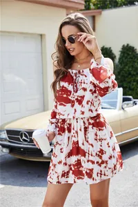 Stylish red tie-dye mini dress with tie-neck and elastic waist for beach vacation