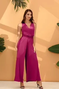 Elegant magenta multi-way jumpsuit with wide-leg design and deep V-neckline detail