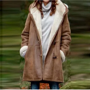 Detail view of a warm brown mid-length hooded winter coat with soft faux fur lining