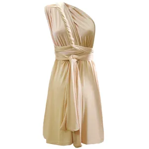 Detail of the twisted strap on a peach multi-way backless infinity dress