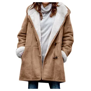 Detail view of winter hooded coat with soft white faux fur lining and toggles.