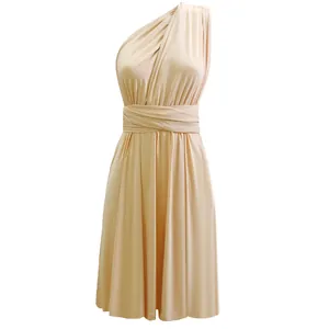 Detailed view of a champagne multi-way convertible wrap dress with pleated bodice detail.
