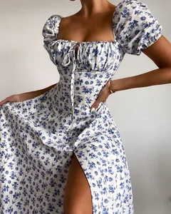 Detailed view of the blue floral puff sleeve midi dress with front tie and high slit