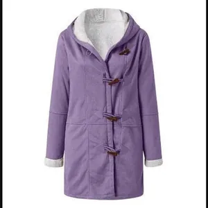 Women's purple hooded winter coat featuring white fleece lining and wooden toggle buttons