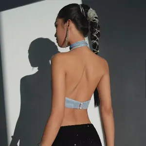Detailed back view of a sexy light blue glitter halter crop top featuring a metallic clasp