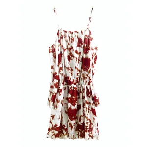 Detail of tie-dye print strappy mini dress with elastic waist for summer vacation style
