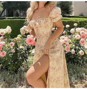 Yellow floral print puff sleeve midi dress with elegant high side slit and tie-neck detail