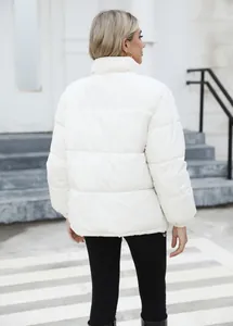 Back view of a warm white puffer jacket for women with a stand collar and quilted design