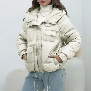 Front view of women's beige thickened hooded puffer jacket featuring multiple utility pockets