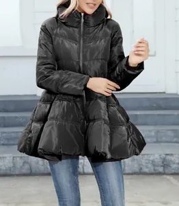 Close-up of black padded coat with unique flared hem and slim stand collar