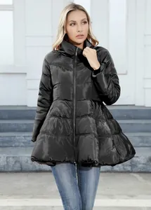 Detail view of women's black puffer coat with elegant flared peplum waist design.