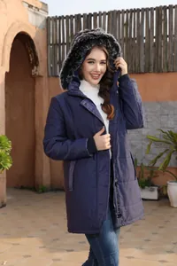 Women's navy blue mid-length puffer jacket with black faux-fur trimmed hood details