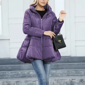 Detailed view of a purple slim-fit puffer jacket with a stand collar on a female model