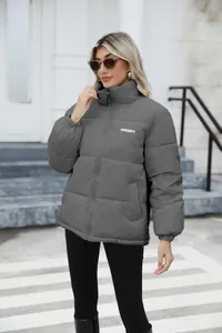 A detailed view of the gray plus size winter puffer jacket with a stand collar and zip