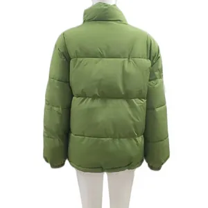 Back view of women's green plus size warm puffer jacket with quilted design and stand collar