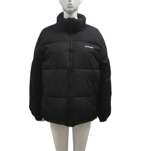 Detailed view of a black winter puffer jacket featuring a stand collar and front zipper