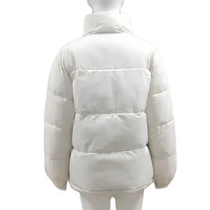 Back view of a white puffer jacket with horizontal quilting on a white mannequin