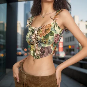 Close-up of floral tapestry corset top with front lacing and square neckline
