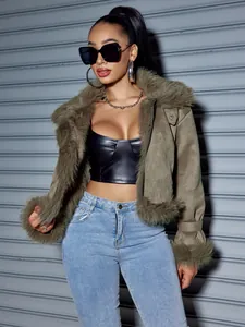 Detailed view of women's brown suede biker jacket with plush faux fur collar and cuffs.