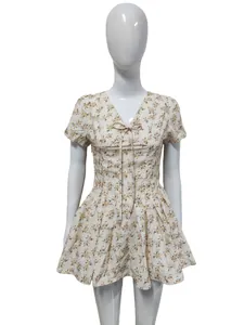 Macro detail of a summer floral French retro dress featuring puff sleeves and a V-neckline