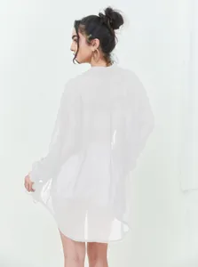 Elegant white sheer long-sleeved button-down shirt with sparkling silver sequins for women