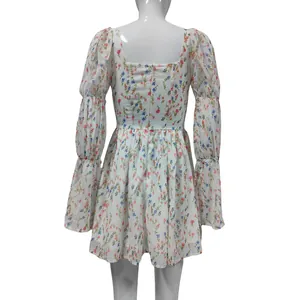Back view of French retro floral mini dress with square neck and puff sleeves