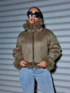 Professional close-up of olive green suede jacket with faux fur collar and cuffs detail