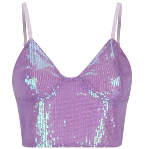 Close-up detail of shimmering iridescent purple sequins on a stylish crop top with thin straps