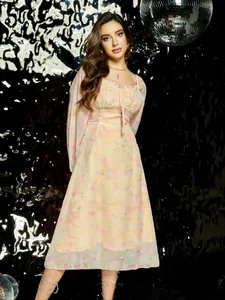 Elegante vestido de manga larga con estampado floral de estilo francés en tonos pastel
