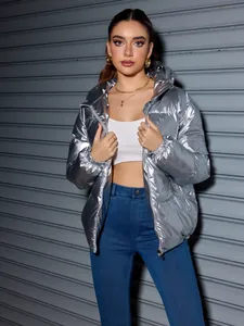 Detailed view of a stylish metallic silver hooded puffer jacket for winter fashion