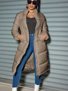 Stylish long puffer coat for women featuring a warm zip-up design for winter fashion