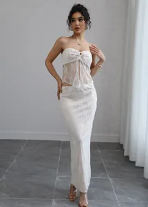 Elegant white lace tube top and long skirt two-piece set for a sexy vacation style look