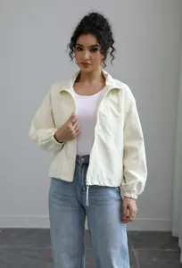 Modern women's cream white waterproof windbreaker jacket with stand collar and zipper