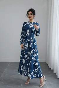 Full view detail of a blue long-sleeved floral maxi dress with elegant French waistline