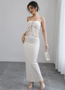 Elegant white lace tube top and maxi skirt two-piece set for summer beach vacations