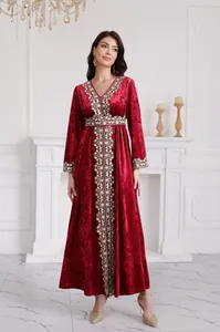 Full length view of elegant red velvet embroidered kaftan dress with intricate patterns