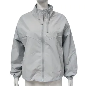 Front view of a grey waterproof windbreaker with stand collar and zip details