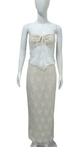Elegant beige floral lace strapless top and matching long skirt two-piece set