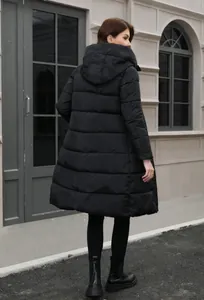 Detailed back view of a long black hooded puffer coat with elegant quilted pattern design