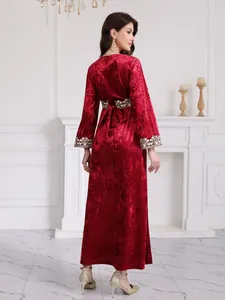 Elegant red velvet long sleeve dress with intricate embroidery and bow belt detail