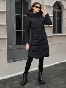 Elegant slim fit long black hooded puffer coat for women with stylish quilted design