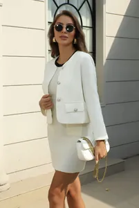 Elegant white tweed two-piece set including a round neck jacket and matching dress