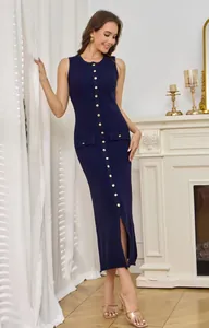 Elegant navy blue knitted sleeveless maxi dress featuring gold buttons and a side slit