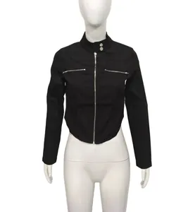 Close-up view of black irregular hem stand collar jacket featuring metal zipper details