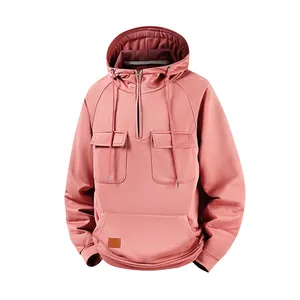 Men's dusty rose hooded sweatshirt featuring half-zip front and multi-pocket utility design