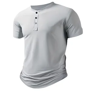 Close-up of men's athletic Henley short-sleeve T-shirt showing fabric texture.